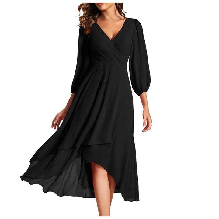 VITTORIA | Elegant dress with asymmetric hem and flowing sleeves. Refined look for any occasion